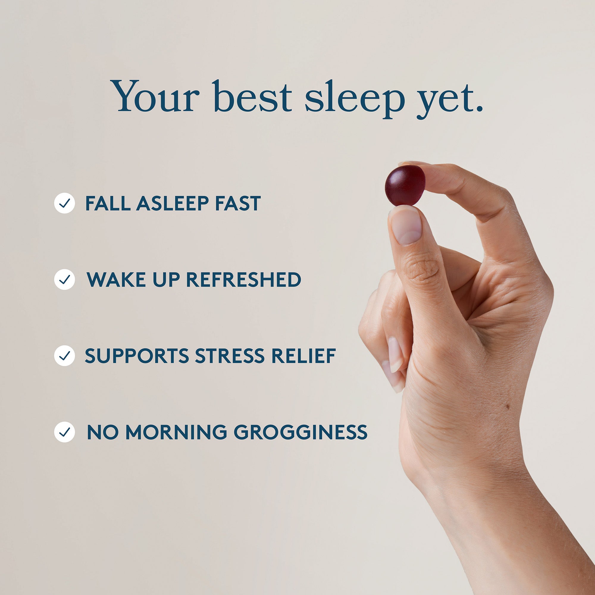 A hand holding an individual Feals Sleep gummy with the title